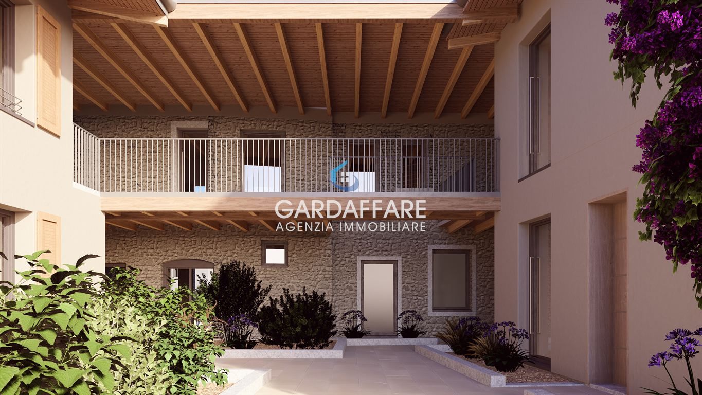 NUOVO TRILOCALE PIANO TERRA VISTA LAGO DI PROSSIMA REALIZZAZIONE A MANERBA DEL GARDA