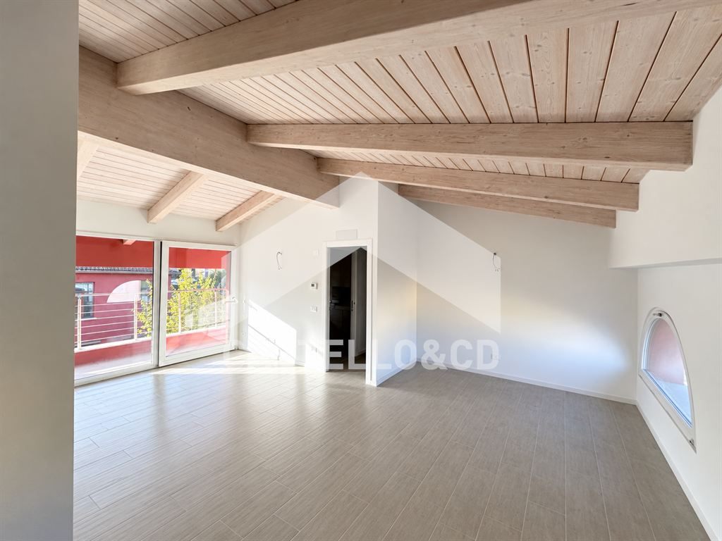 Trilocale con loggia