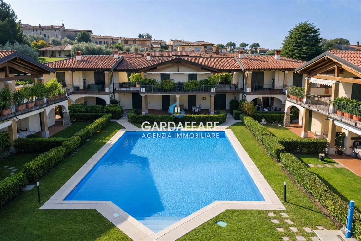 TRILOCALE AL PIANO TERRA IN SIGNORILE RESIDENCE A MANERBA DEL GARDA