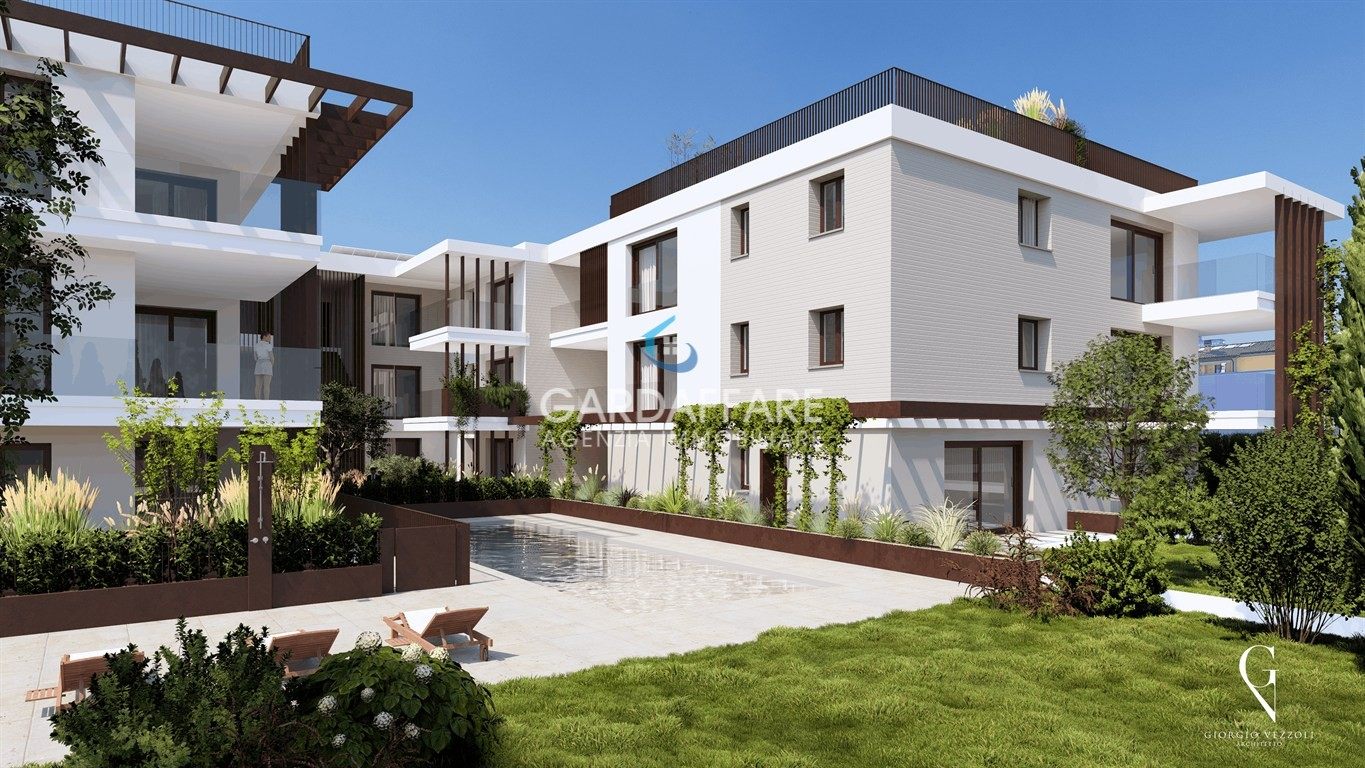 Attico quadrilocale con terrazzo sundeck vista lago !